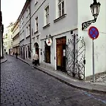 U Cervene Zidle - Red Chair